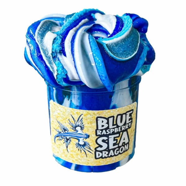 Swirly patterned slime in shades of blue and white is piled into a jar with a label that says Blue Raspberry Sea Dragon Slime.