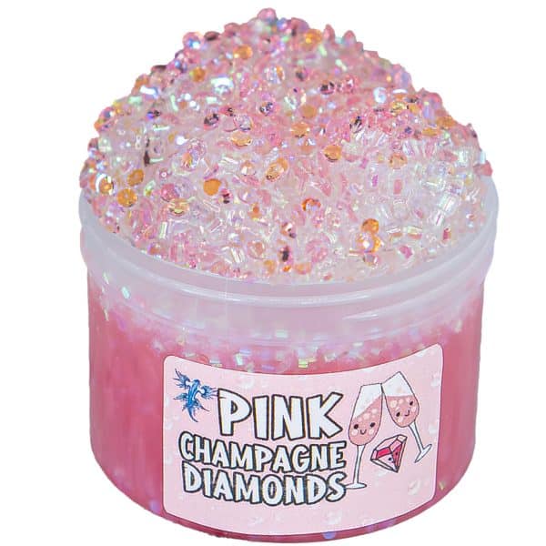 A clear plastic jar is filled with shimmery pink clear slime with a mound of clear snow fizz slime rising above the edge of the jar and sprinkled with a cover of pink rhinestones. A lable on the jar reads Pink Champagne Diamonds.