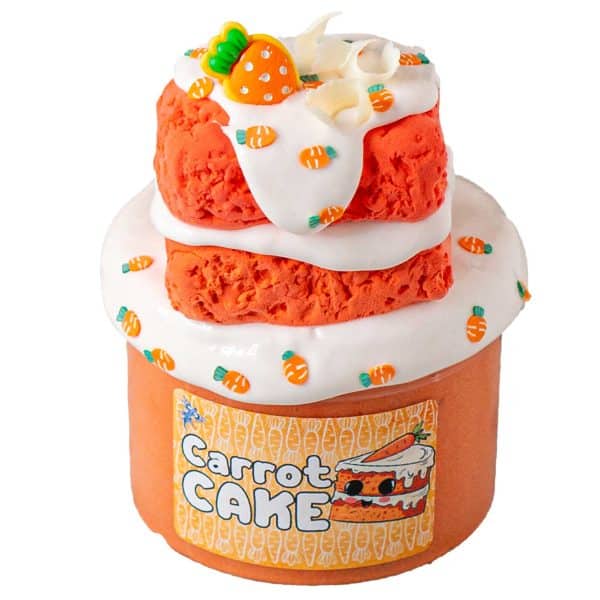 A jar is filled with orange cloud slime and topped with a white glossy slime that looks like frosting. More white frosting, clay cake layers, carrot sprinkles and a carrot charm are assembled on top to look like a carrot cake. The label reads Carrot Cake Slime