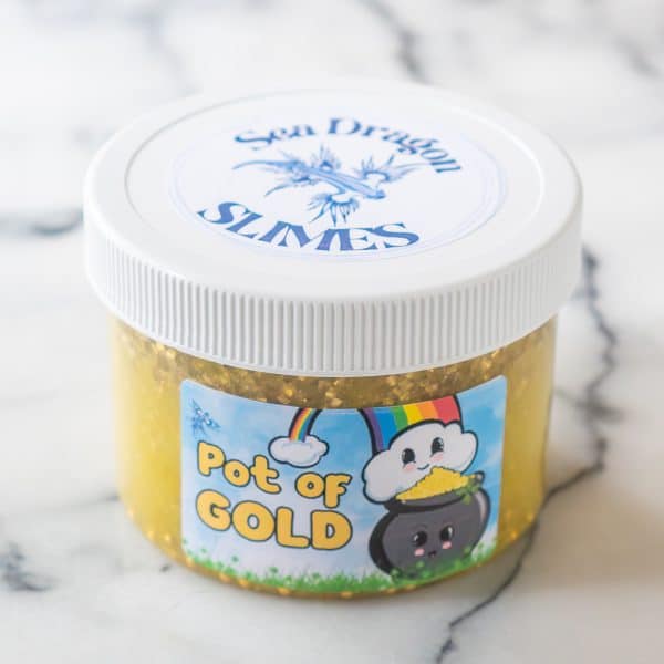 A jar of gold slime, called Pot of Gold, with gold bingsu beads that floated to the top, and gold pearl beads that sank to the bottom.