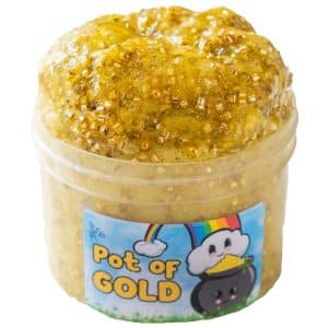 A translucent jar is overfilled and piled high with a shiny gold slime dotted with gold bingsu beads and golden pearl beads. A blue label on the jar featuring a rainbow and pot filled with gold coins reads Pot of Gold Slime.